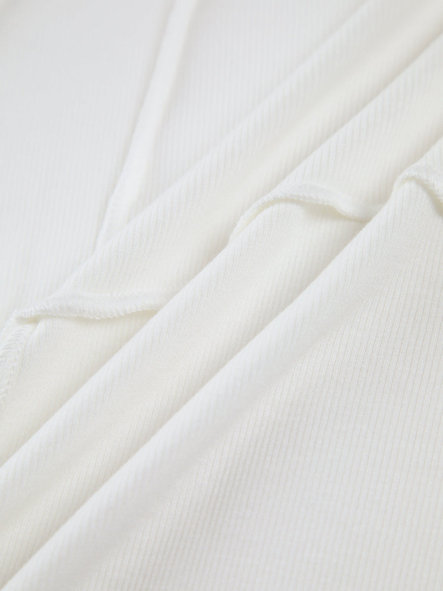 Freja | Elegant ribbestrikket langermet topp med skreddersydd piping