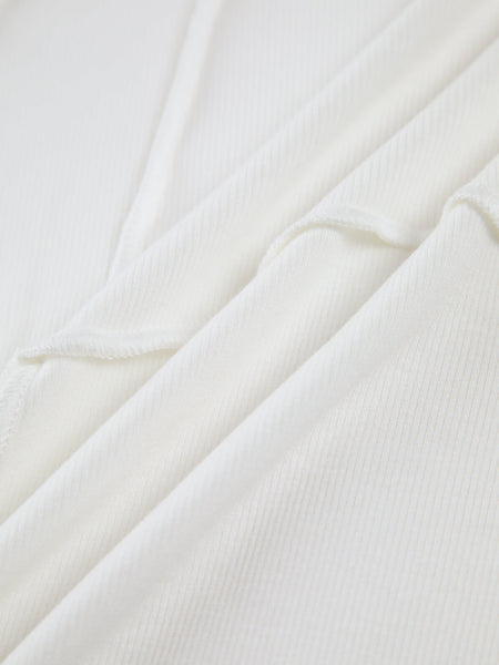 Freja | Elegant ribbestrikket langermet topp med skreddersydd piping