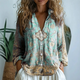  Turkis mønsterbluse